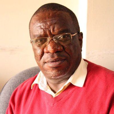 passport-sized photo of John Gikonyo jpg