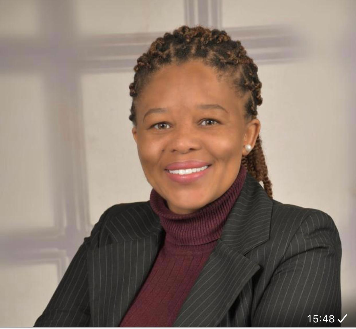 Passport-size photo of Tracy John jpg